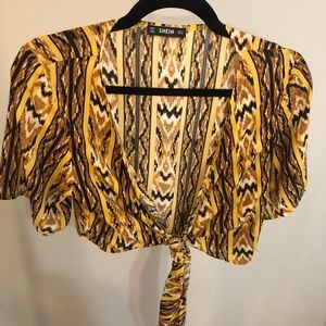 Cropped, patterned, cross tie blouse